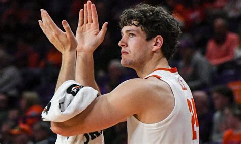 What Channel is the Clemson Basketball Game Today? And Why Does the Moon Sometimes Look Like a Basketball?